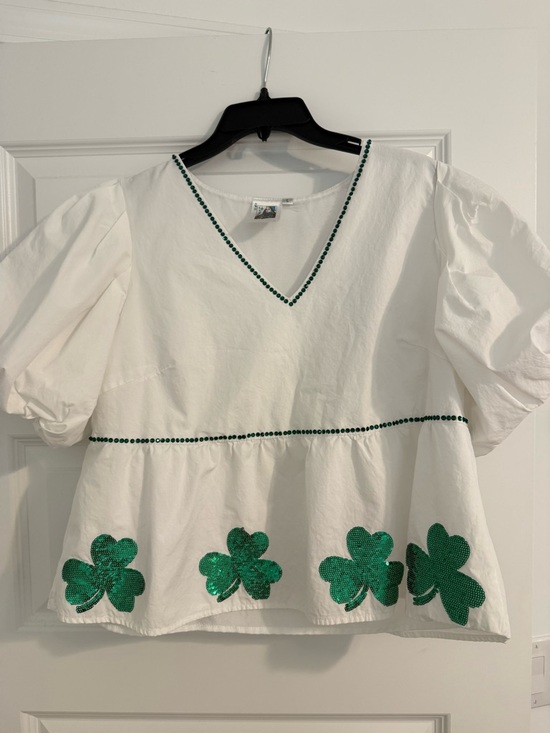 QUEEN OF SPARKLES Tops - QOS: Women’s White V-Neck Peasant/peplum top with Green Sequin Clover Accents